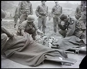 First Aid Prints: Wounded Soldier Receiving Aid