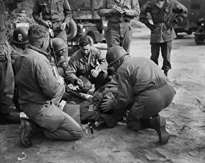 First Aid Prints: Wounded Soldier Receiving Blood Plasma