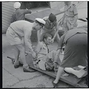 Hanoi Prints: Wounded Soldier on Stretcher