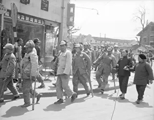 Disabled Prints: Wounded Soldiers Walking on Crutches