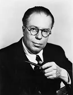Writer Christopher Morley with Pipe in Hand