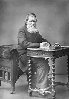 Writer John Ruskin at Desk