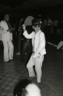 Writer Prints: Writer Truman Capote Doing Fan Dance at Studio 54