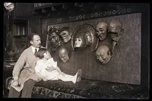 Benda Prints: W.T. Benda with Daughter in Lap Looking at Masks