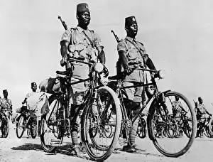 WWII Native African Troops with Bicycles