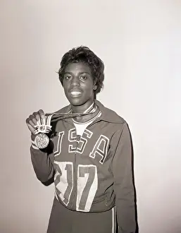 Gold Medal Prints: Wyomia Tyus Poses with Olympic Gold Medal