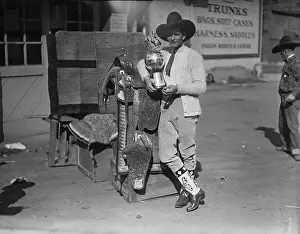 Yakima Canutt Posing in Cowboy Outfit