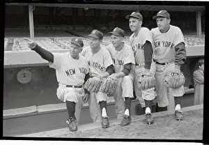 Yankee Manager Casey Stengel and Teammates Posing in Dugout