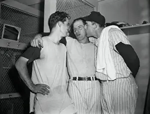 Yankee Players Embracing in Locker Room