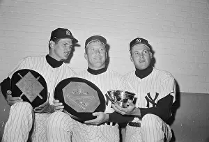 Yankees Holding Trophies