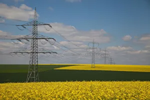 Images Dated 13th May 2012: Yellow fields with power towers, Dusseldorf, Nordrhein-Westfalen, Germany