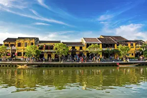 Yellow old houses of ancient town Hoi An nearby Thu Bon river
