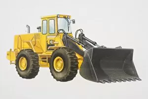 Yellow wheel loader, side view