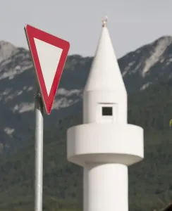 Traffic Sign Prints: Yield-sign with minaret, controversial mosque in Telfs, Tyrol, Austria, Europe