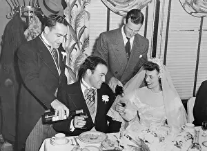 Yogi Berra Filling Glasses at Wedding