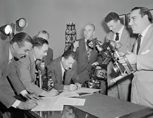 Yogi Berra and Gil McDougald Sign Contracts