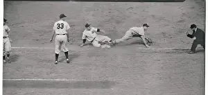 Yogi Berra Tagged Out at First Base