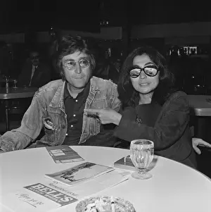 Songwriter Prints: Yoko Ono and John Lennon Pose at Airport