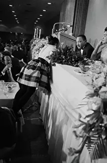 Yolande King Standing On Chair