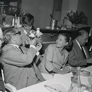Young Alexander Onassis Giving Gift to His Father Aristotle