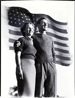 Optimism Prints: Young American Couple Posing with Flag