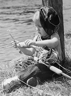 Sunshine Prints: Young boy (4-5) fishing