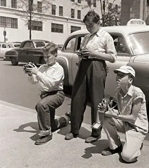 Amateur Prints: Three Young Boys Photographing