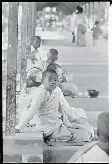 Young Buddhist and Others Seeking Help on Road