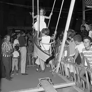 Young Caroline Kennedy Swinging with Another Girl