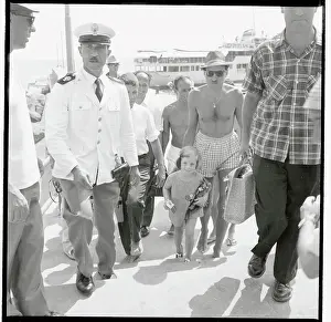 Young Caroline Walking with Police During Trip in Amalfi