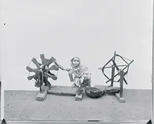 Mumbai Prints: Young Child Using Charka to Weave