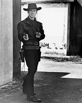 Young Clint Eastwood in Gunslinger Pose