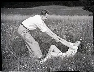 Girlfriend Prints: Young Couple Frolicking in Grass