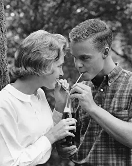 Girlfriend Prints: Young couple sharing soda