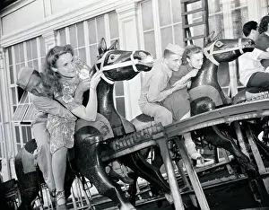 Teenage Boy Prints: Young Couples on Steeplechase Ride