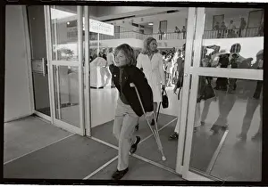 Difficult Prints: Young Edward Kennedy Jr. Walking on Crutches in Front of Joan Kennedy