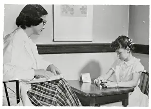 Young Epileptic Girl Taking Intelligence Test