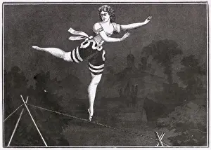 Young Female Acrobat Balancing Herself on a Tightrope