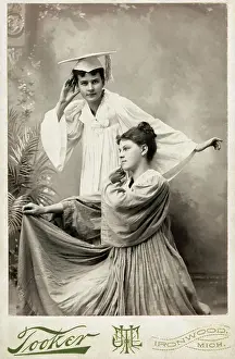 Young Female Graduates Posing to Enter the World