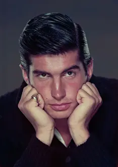 Headshoulders Prints: Young George Hamilton in Sullen Pose