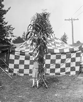 10 12 Years Prints: Young girl (10-12) posing with giant maze