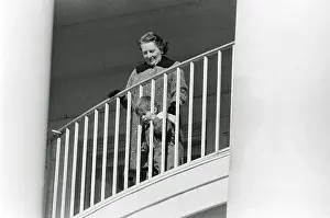 Young John F. Kennedy Jr. Peeping at His Father from Balcony