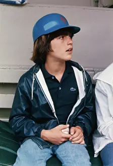 Spectators Prints: Young John F. Kennedy, Jr. Wearing Batting Helmet