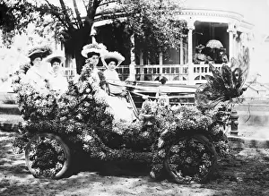 Mardi Gras Prints: Four Young Ladies In Flower Decorated Ca