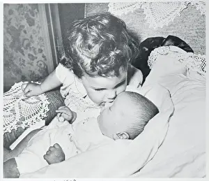 Young Lucie Arnaz Leaning to Her Baby Brother