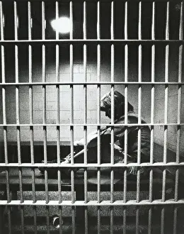 Punishment Prints: Young Man Behind Bars
