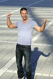 Satisfaction Gallery: Young man cheering in the sunshine