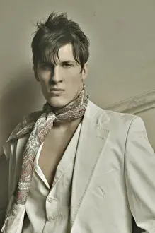 Neckerchief Prints: Young man in an old stairwell, nostalgic portrait