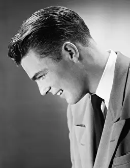 Young man posing in studio, (B&W), (Close-up), (Portrait)