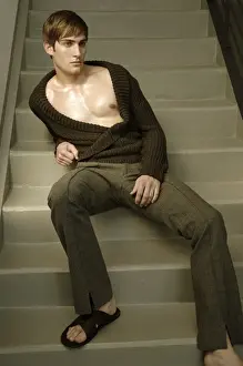 Reflective Prints: Young man sitting on the stairs